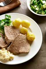 Boiled beef with potatoes and horseradish