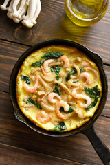 Mushroom and spinach frittata with shrimps