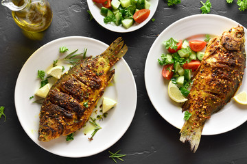 Roasted fish on plate