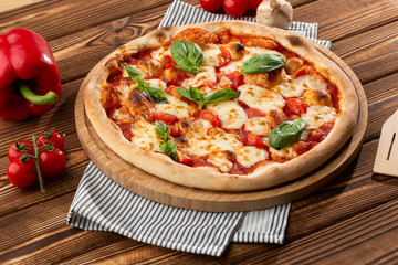 Flyer and poster for Restaurants or pizzerias, template with delicious taste margarita pizza, mozzarella cheese, cherry tomatoes.