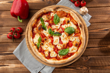 Flyer and poster for Restaurants or pizzerias, template with delicious taste margarita pizza, mozzarella cheese, cherry tomatoes.