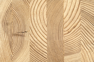 Cross-section of glued wooden timber of pine.