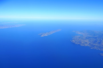 Aerial view of island of Makronisos and the Diavlos Makronisou channel south of Athens in Greece