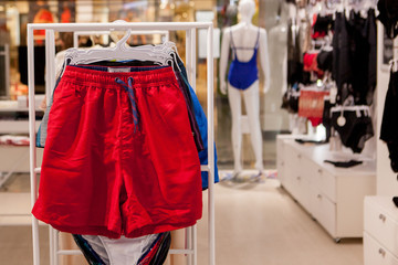 Close up Men's swimming trunks in the store.