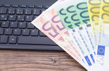 Banknotes and keyboard
