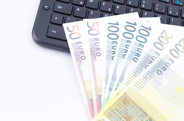 Keyboard and banknotes