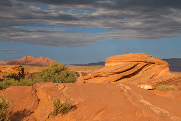 Towards Horseshoe bend view with colorful rocks, skies and distance