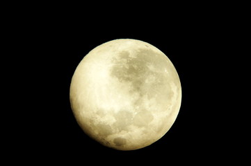 The moon shining in a dark night