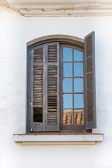 Spanish style wooden window in decay