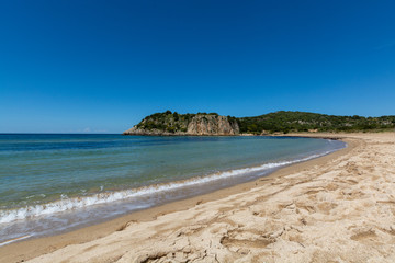 Voidokilia Beach, popular white sand and blue clear water beach in Messinia in Mediterranean area in shape of Greek letter omega, Peloponnese, Greece.