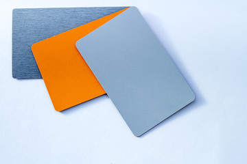 Concept of color cards on white background three colors grayscale and orange isolate on white background
