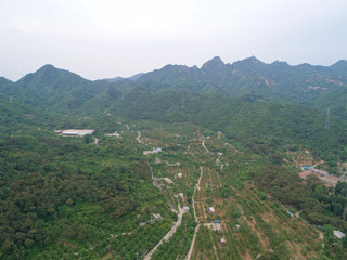 Aerial view of Moutain with Great Wall of China on the background. Hebei province next to Beijing. 