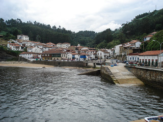 Obraz premium View of the town of Cudillero, in Asturias (Spain). Picturesque and tourist village of the Cantabrian coast where you can sleep and eat in your hotels and restaurants