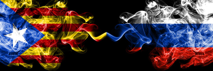 Catalonia vs Russia, Russian smoke flags placed side by side. Thick colored silky smoke flags of Catalonia and Russia, Russian
