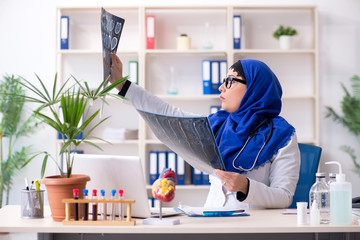 Female doctor in hijab working in the hospital
