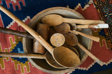 Collection of old rustic wooden kitchen utensil, bowl, plate, spoon
