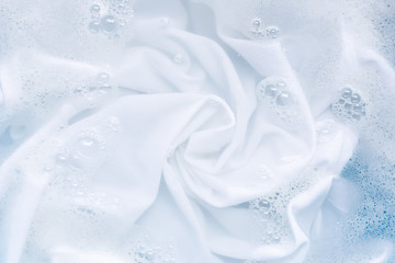 Obraz na płótnie Canvas Soak a cloth before washing, white cloth.