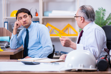 Two architects working on the project 