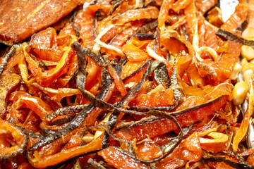 A background of pink salmon jerky