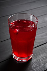 cranberry lemonade on the black wooden background