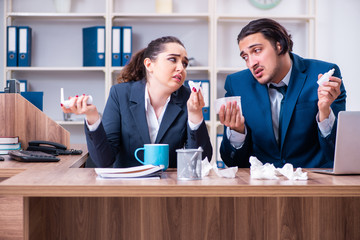Two employees suffering at workplace 