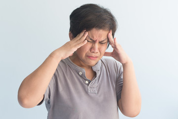 sick asian senior woman suffering from headache
