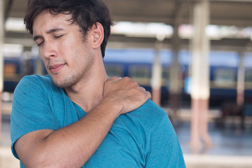 man suffer from stiff shoulder, muscle inflammation