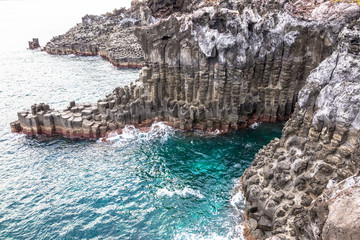 Volcanic pillar cliff near sea shore seaside in Jusangjeolli Seogwipo Jeju South Korea