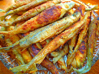 fried fish smelt on a dish close-up