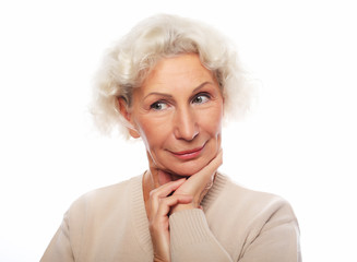 lifestyle, emotion and people concept: Close up portrait of happy senior woman smiling