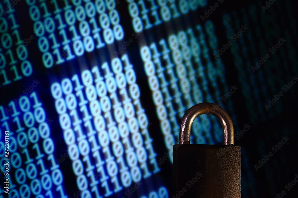 Poster binary computer language matrix blurred be hide an iron padlock. sign of computer privacy protection