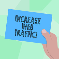 Conceptual hand writing showing Increase Web Traffic. Business photo showcasing Boost the amount of data transmitted by site visitors Drawn Hu analysis Hand Holding Blank Color Paper Cardboard