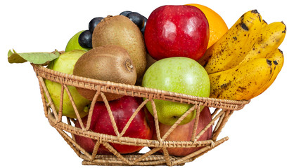 Basket wicker with tropical fruits isolated on white background with clipping path.
