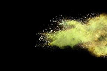 Abstract powder splatted background. Colorful powder explosion on black background. Colored cloud....