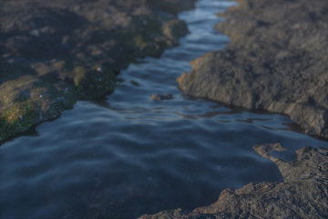 The river between the mountains in a sunny day, 3d rendering