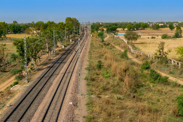 Fototapeta na wymiar Traction power line rail corridor. Railroad tracks