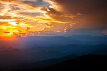 Majestic sunset sky over the mountains landscape