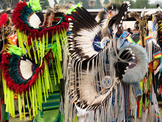 Two Native American Fancy Dancers Waiting to Dance at a Pow Wow