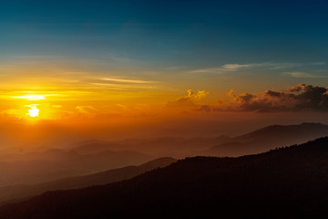 Majestic sunset sky over the mountains landscape