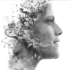 Double exposure. Paintography. Close up portrait of an attractive woman with strong ethnic features combined with unusual hand drawn painting, black and white
