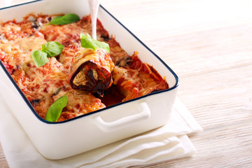 Eggplant rolls with cheese and herb filling