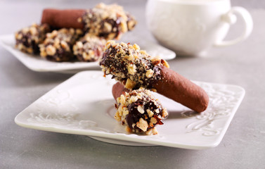 Chocolate butter logs with nuts