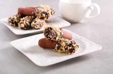 Chocolate butter logs with nuts