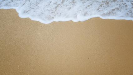 Fototapeta na wymiar White sandy beach background and sea