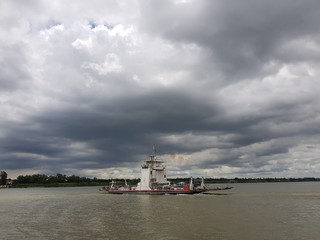 ferry with grey skies