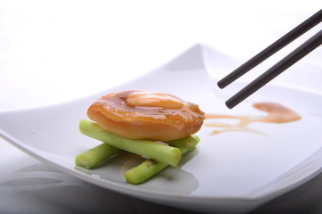 Fine dining of Abalone in a restaurant where presentation is important