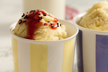  close-up ice cream with syrup and noodles