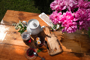Chamomile tea with mint and jam in the morning at the cottage