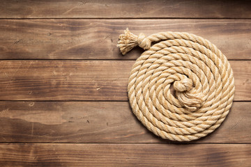 ship rope at wooden background texture