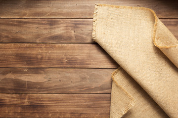 burlap hessian sacking on wooden background table